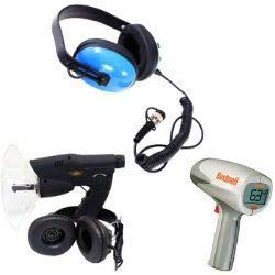 A collection of electronics including headphones, a thermal imager, and a noise monitoring device.