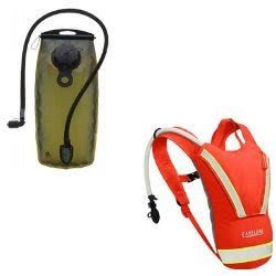 Hydration packs including a green hydration reservoir and a red vest-style pack, perfect for outdoor adventures.