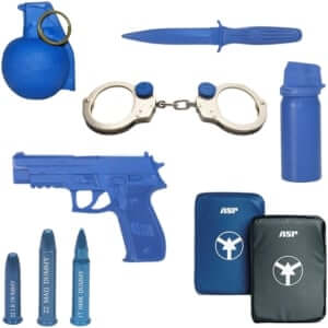 Blue training gear including a grenade, knife, handcuffs, spray and training gun for tactical safety and defense preparation.