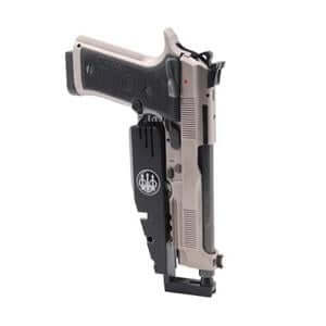 Competition holster with a firearm, showcasing a sleek design and secure fit for optimal performance.