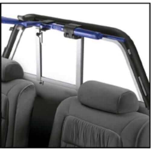 Rear seat area of a vehicle showing a blue support bar for enhanced storage and safety.