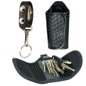 Stylish black key holders featuring a keychain and a compact organizer for easy access and storage.