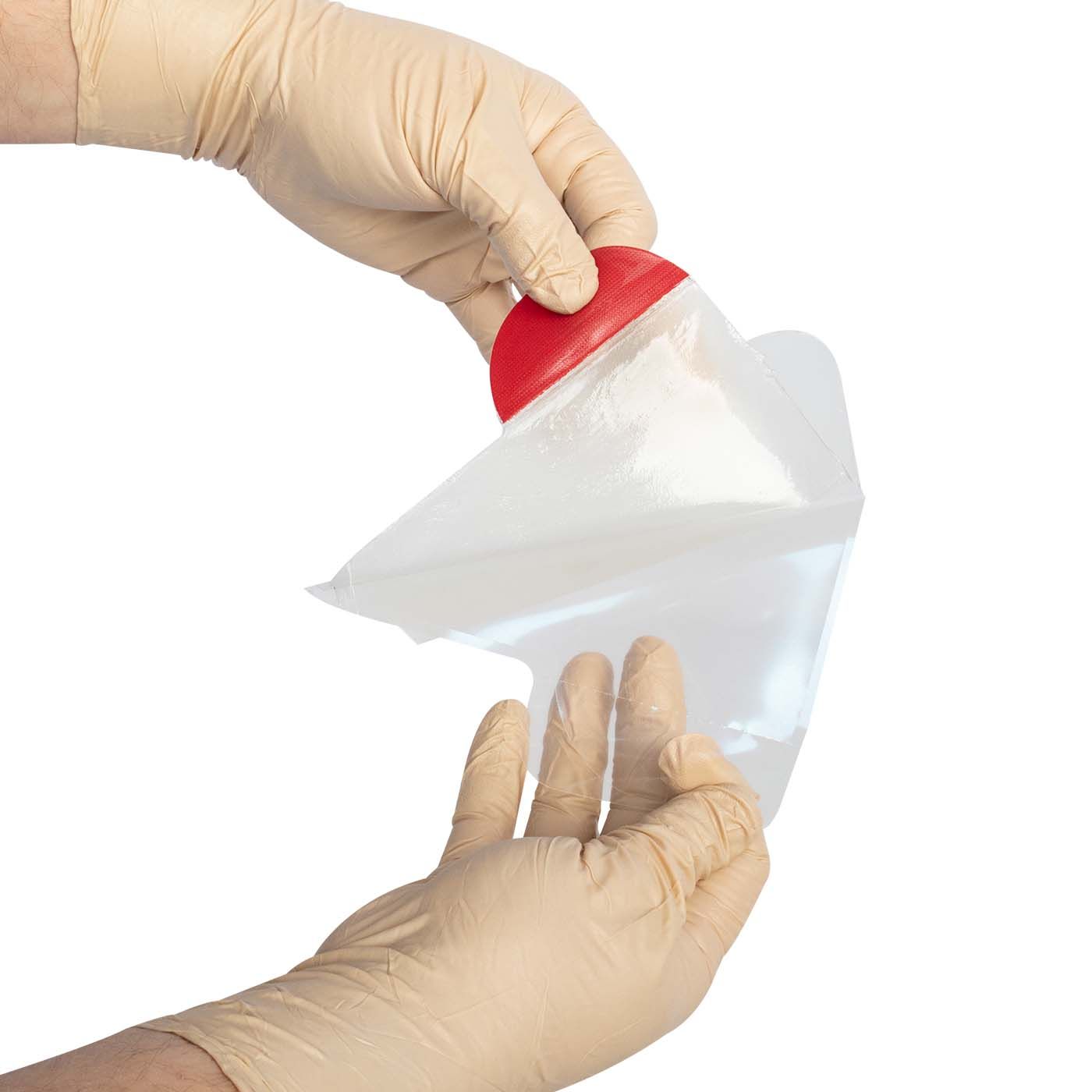 Hand wearing a beige glove holding a white plastic bag with a red handle against a white background