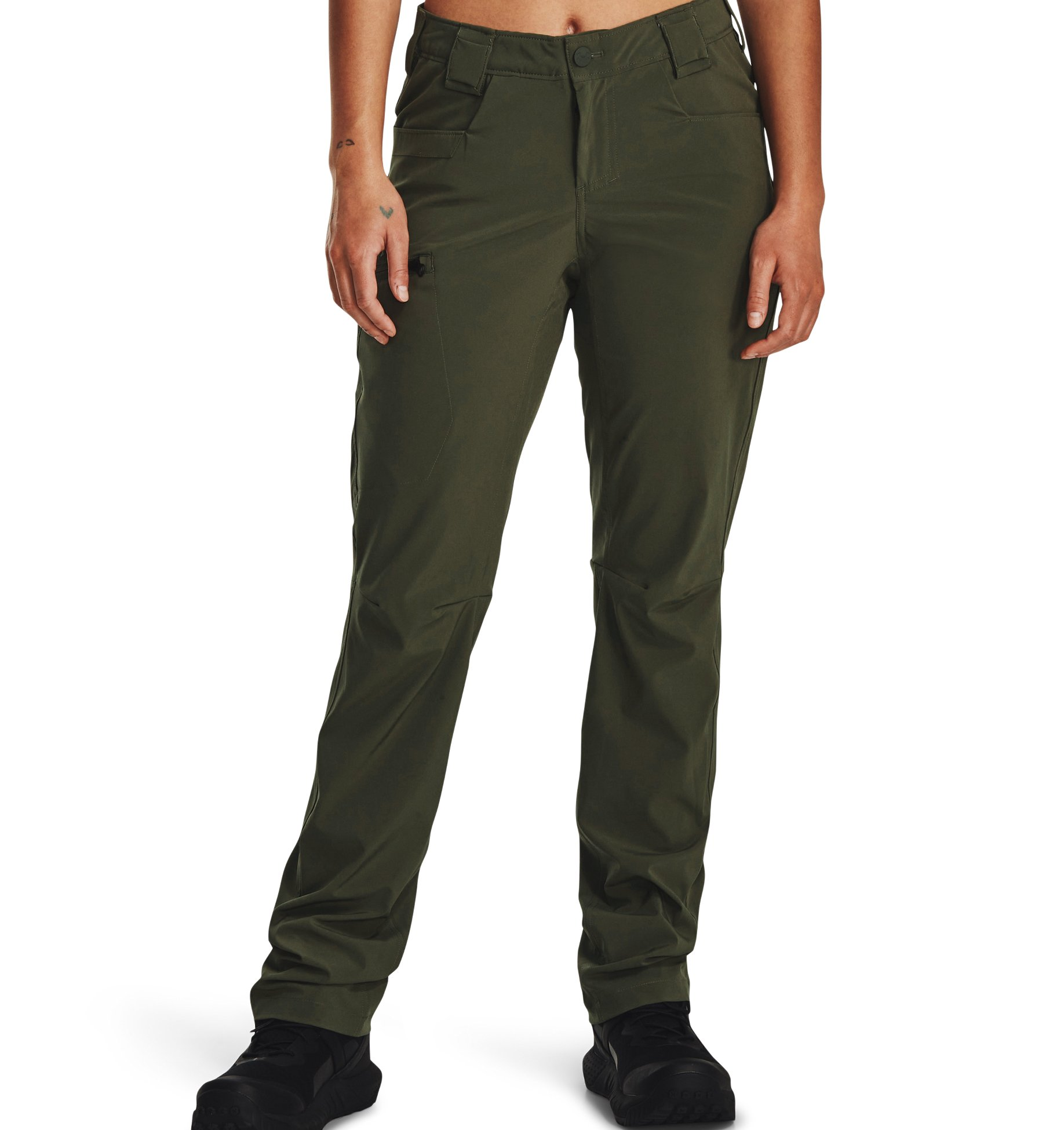 Under Armour Women's UA Defender Pants in green, featuring durable fabric and multiple pockets for functionality and comfort.