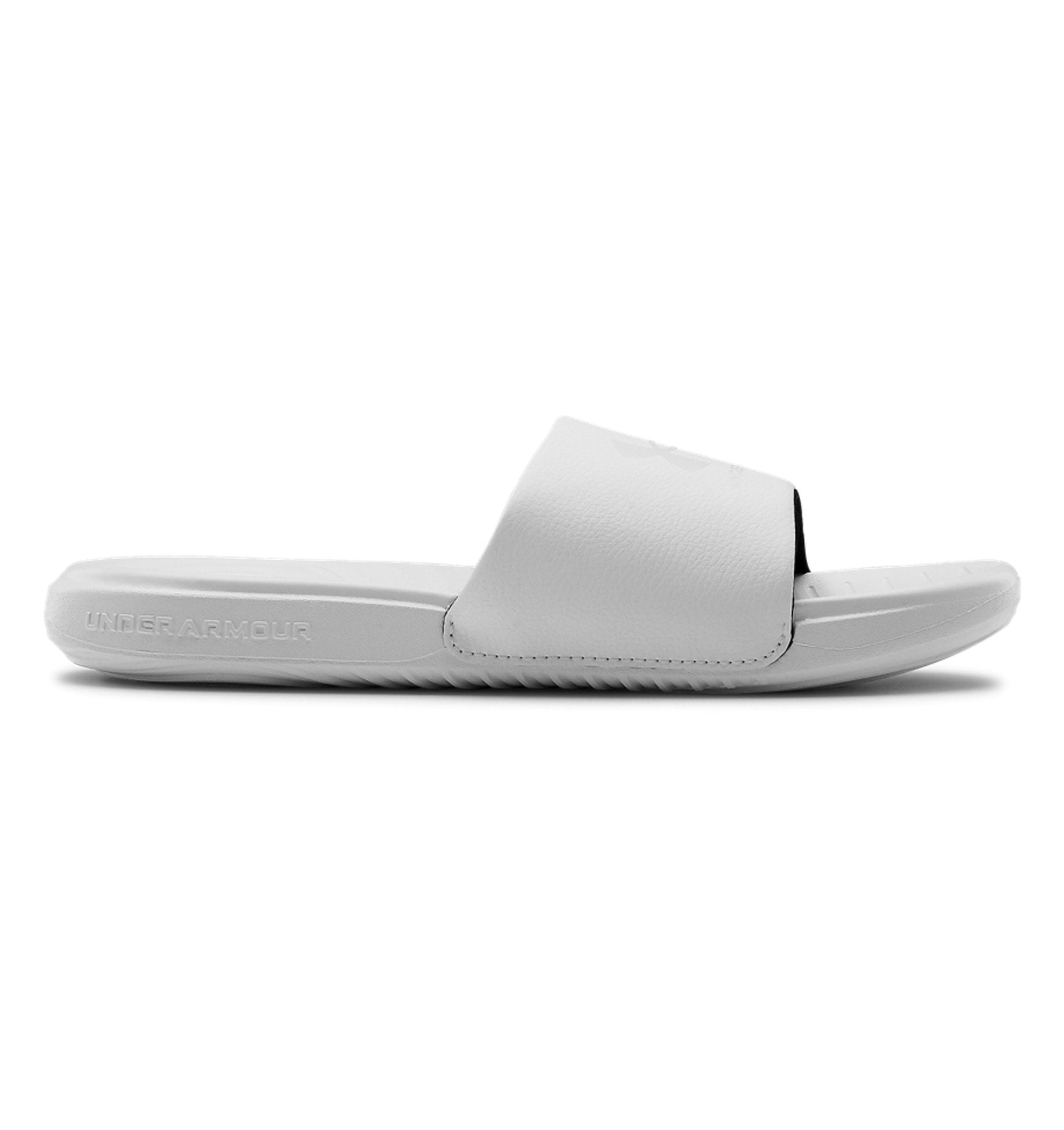 Under Armour Women's UA Ansa Fixed Slides in white, featuring a fixed strap and EVA footbed for ultimate comfort.