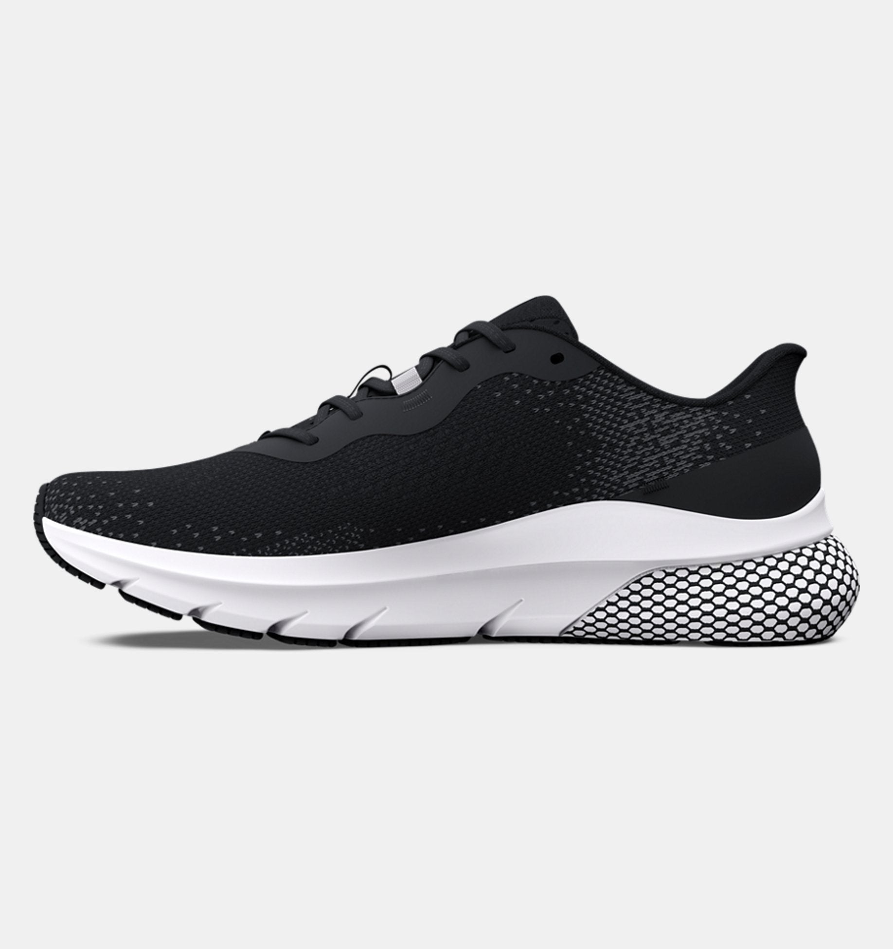 Black running shoe with white sole on a light gray background