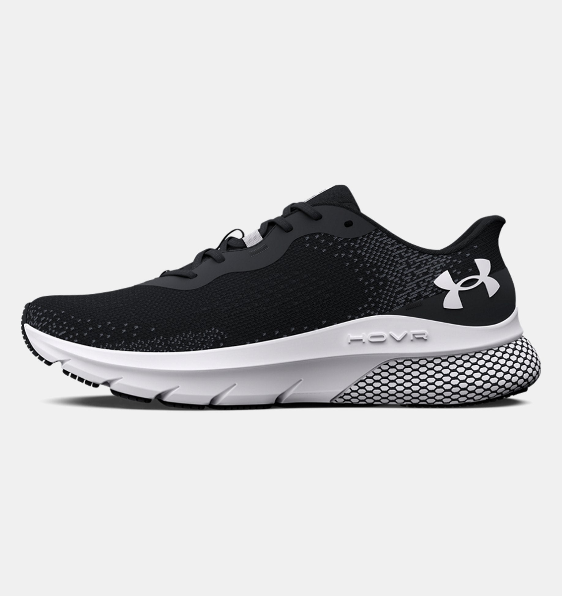 Black running shoe with white sole on a light gray background