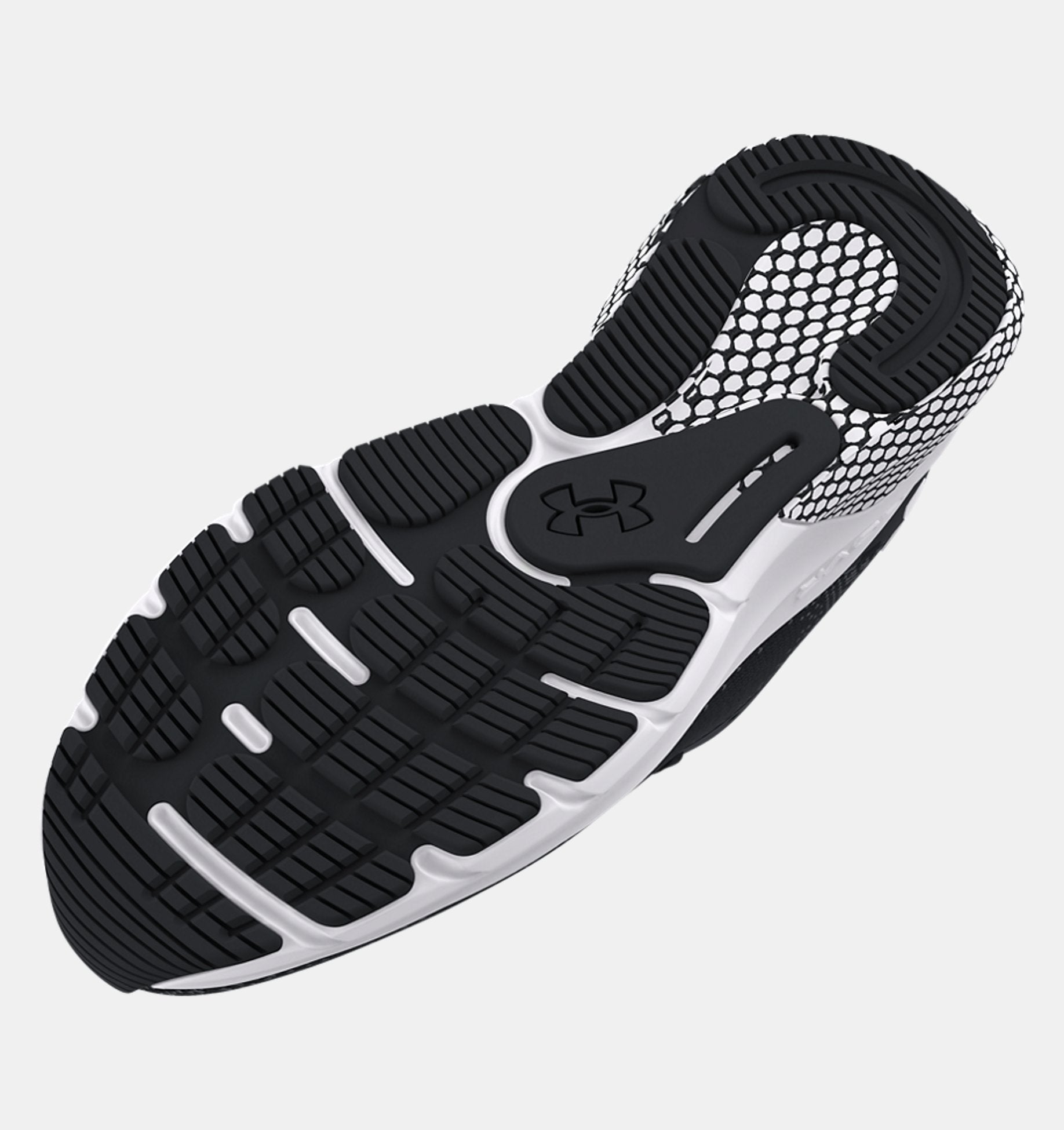 Black and white athletic shoe with sole pattern on a light gray background