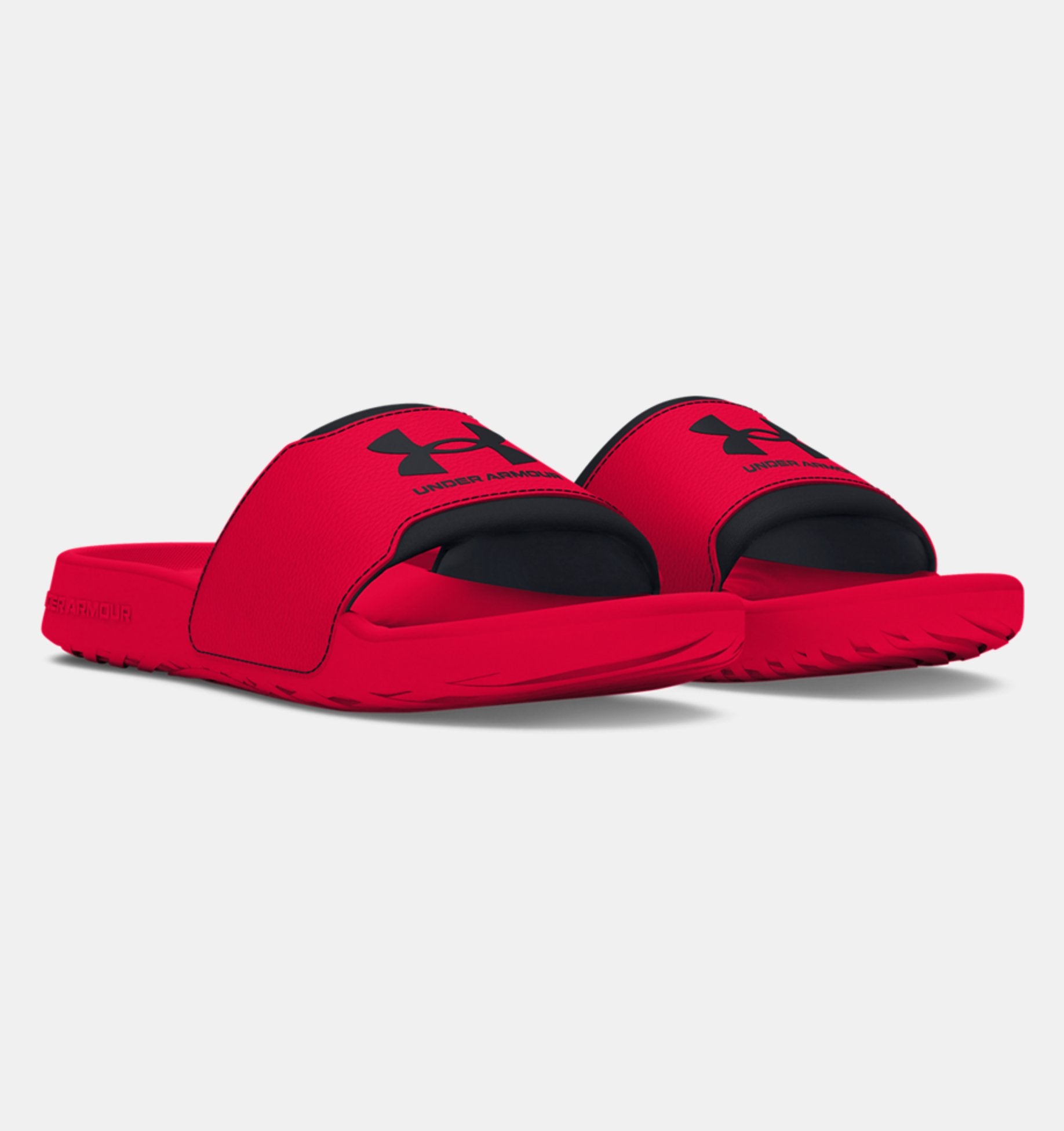 Under Armour Men's UA Ignite Select Slides in red, designed for ultimate comfort and post-workout relaxation.