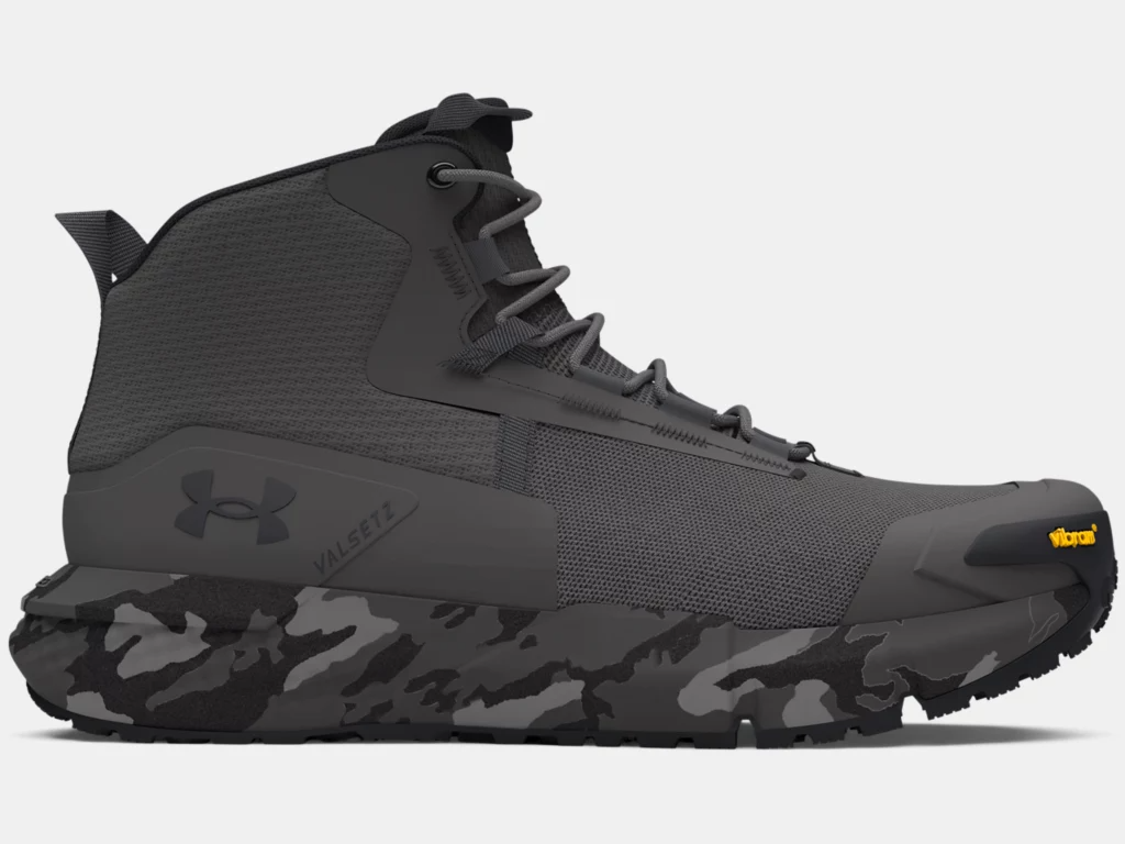 Under Armour UA Charged Valsetz Mid men's tactical boots with a durable, breathable synthetic upper and camo patterned sole.