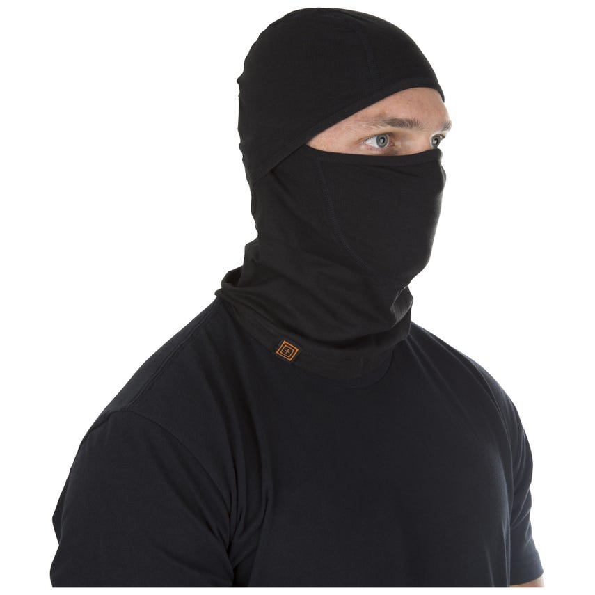 Person wearing a black balaclava on a white background