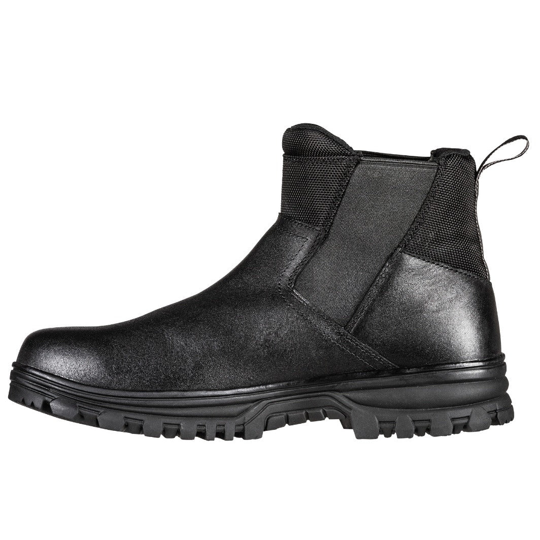 Black Chelsea boot on a white background