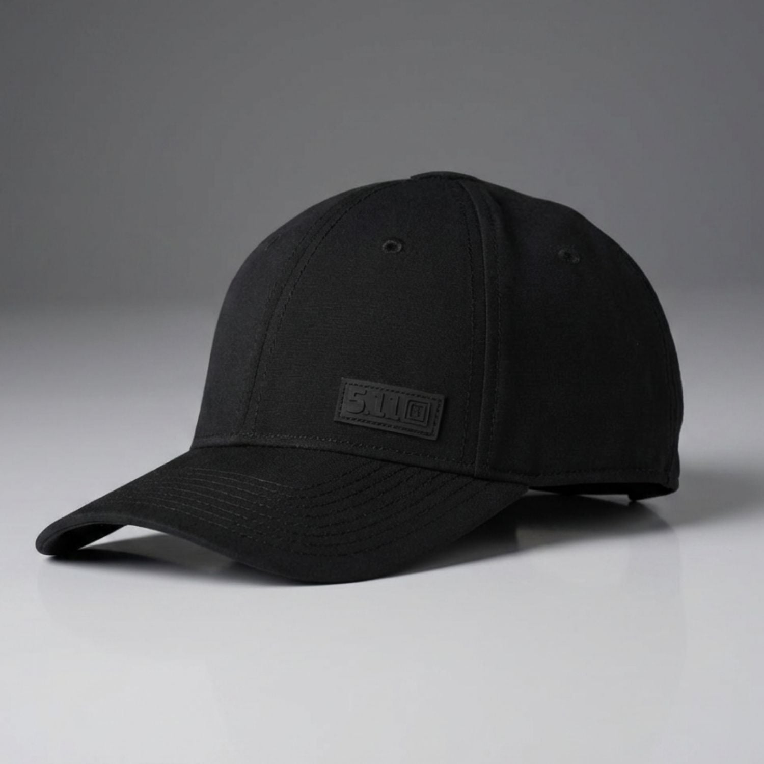 Black cap with a logo on a gray background