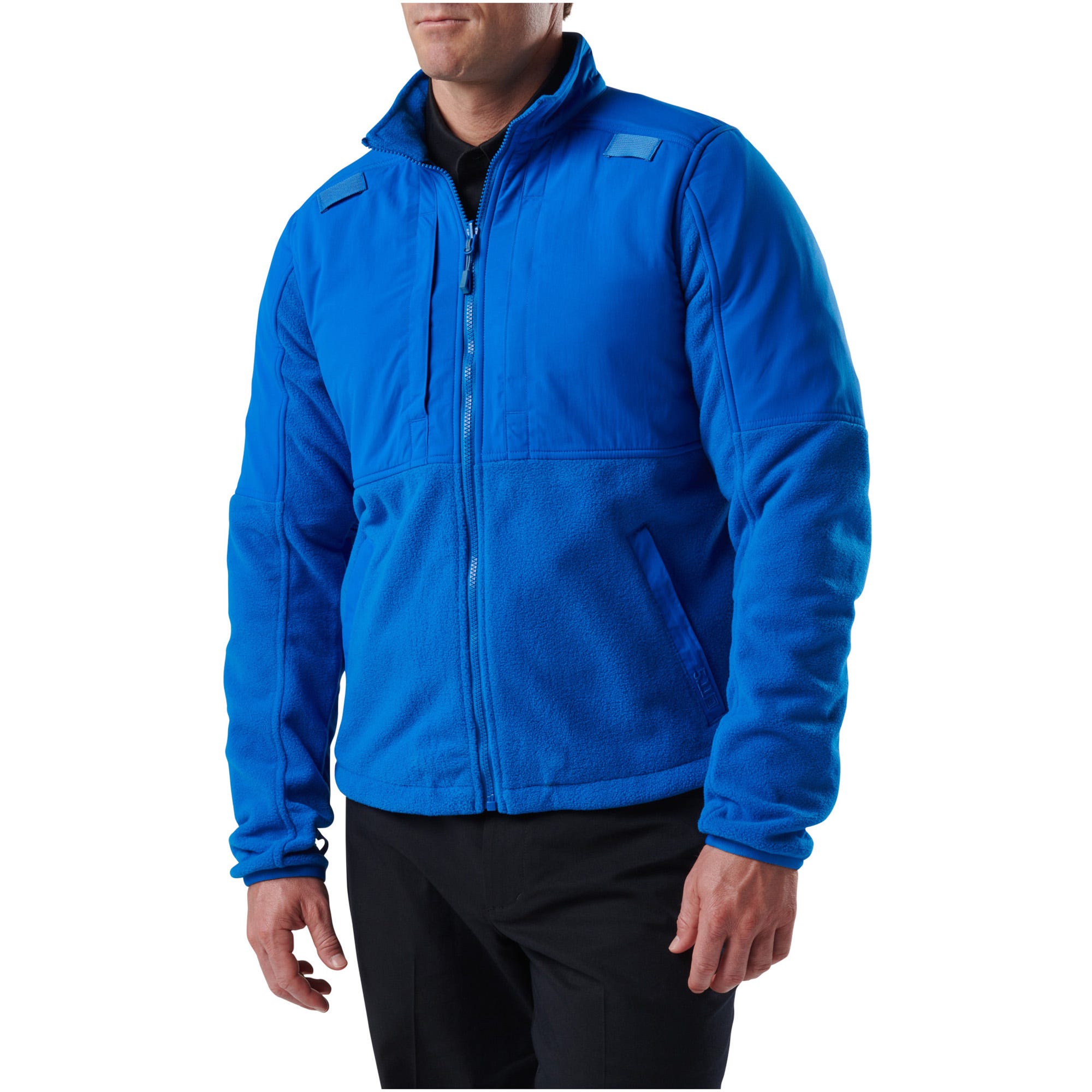Person wearing a blue jacket on a white background