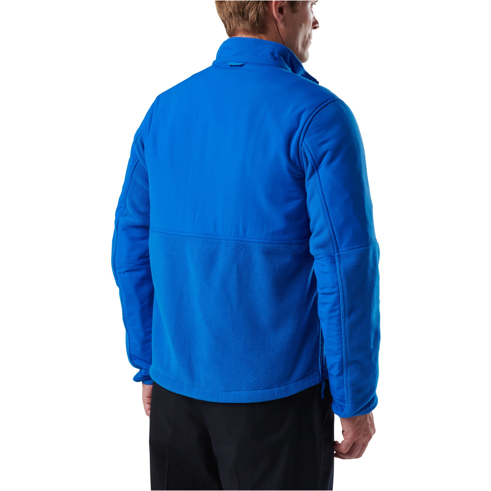 Person wearing a blue jacket on a white background