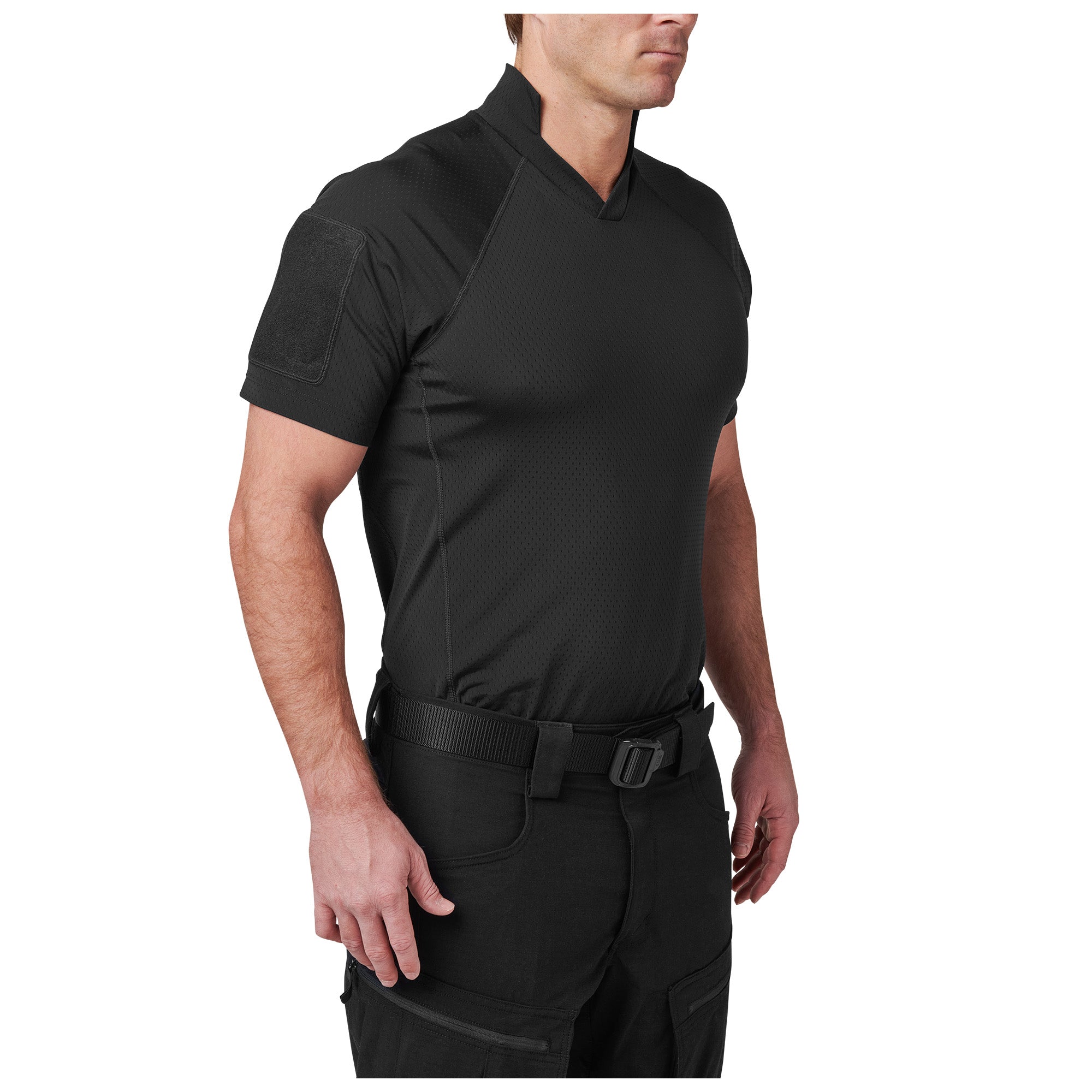 Person wearing a black short-sleeve shirt and pants on a white background