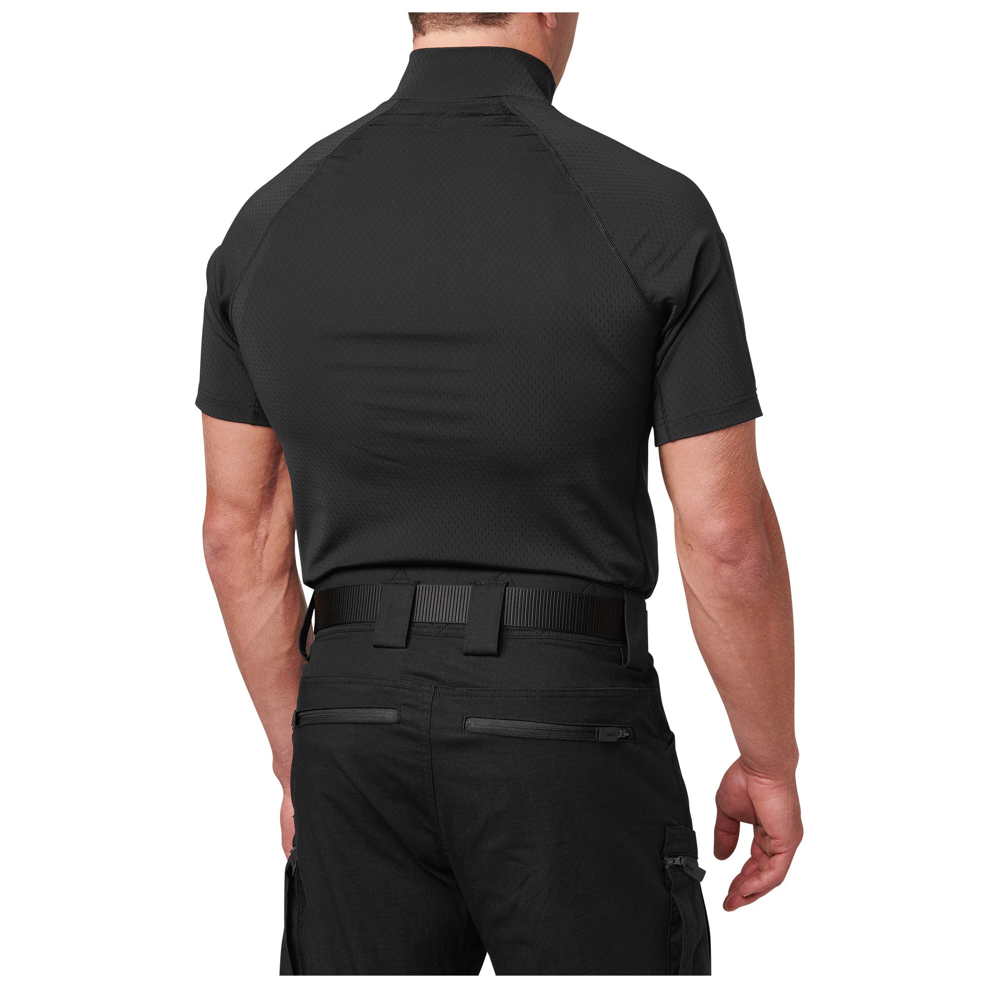 Person wearing a black tactical shirt and pants on a white background