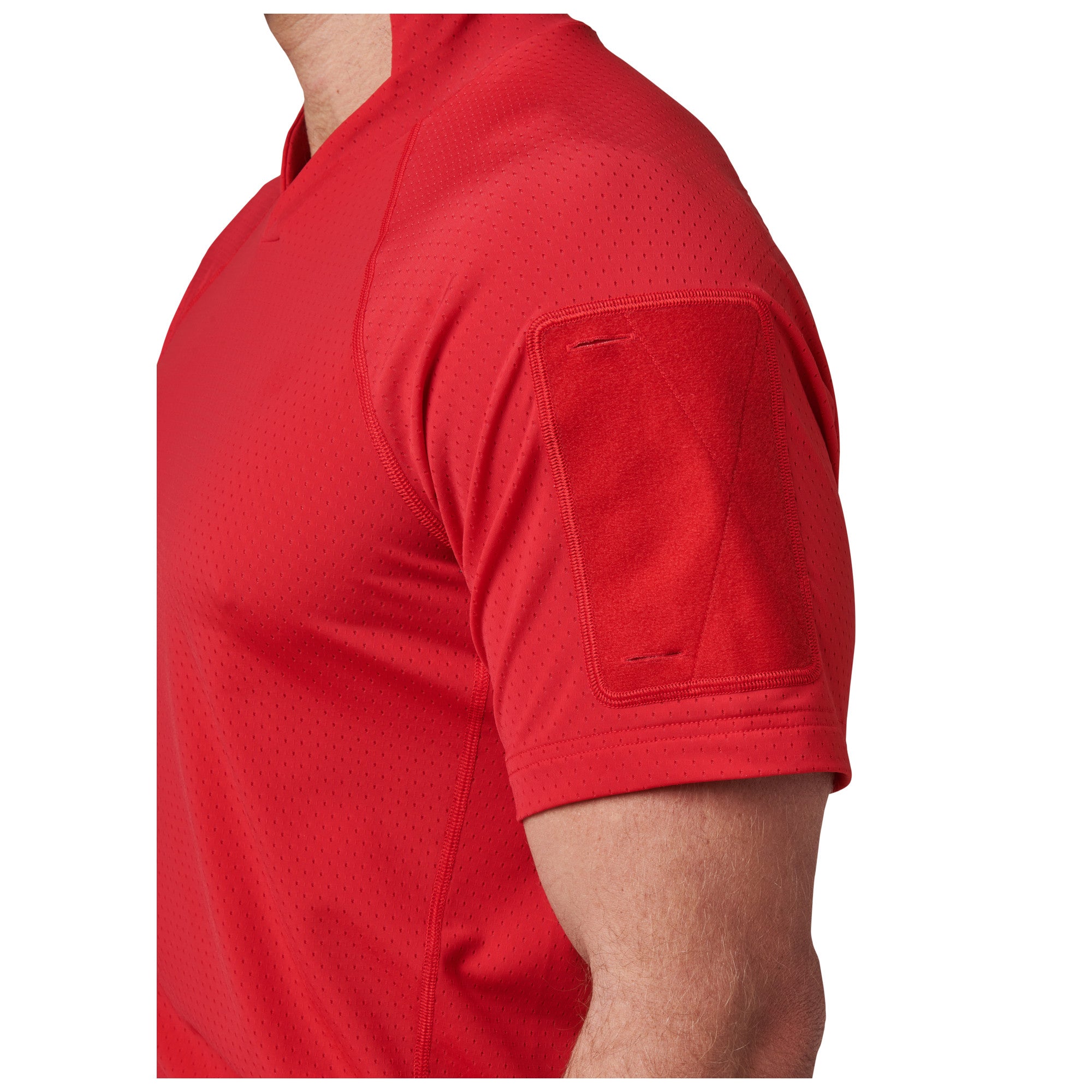 Red polo shirt with elbow patch on a white background