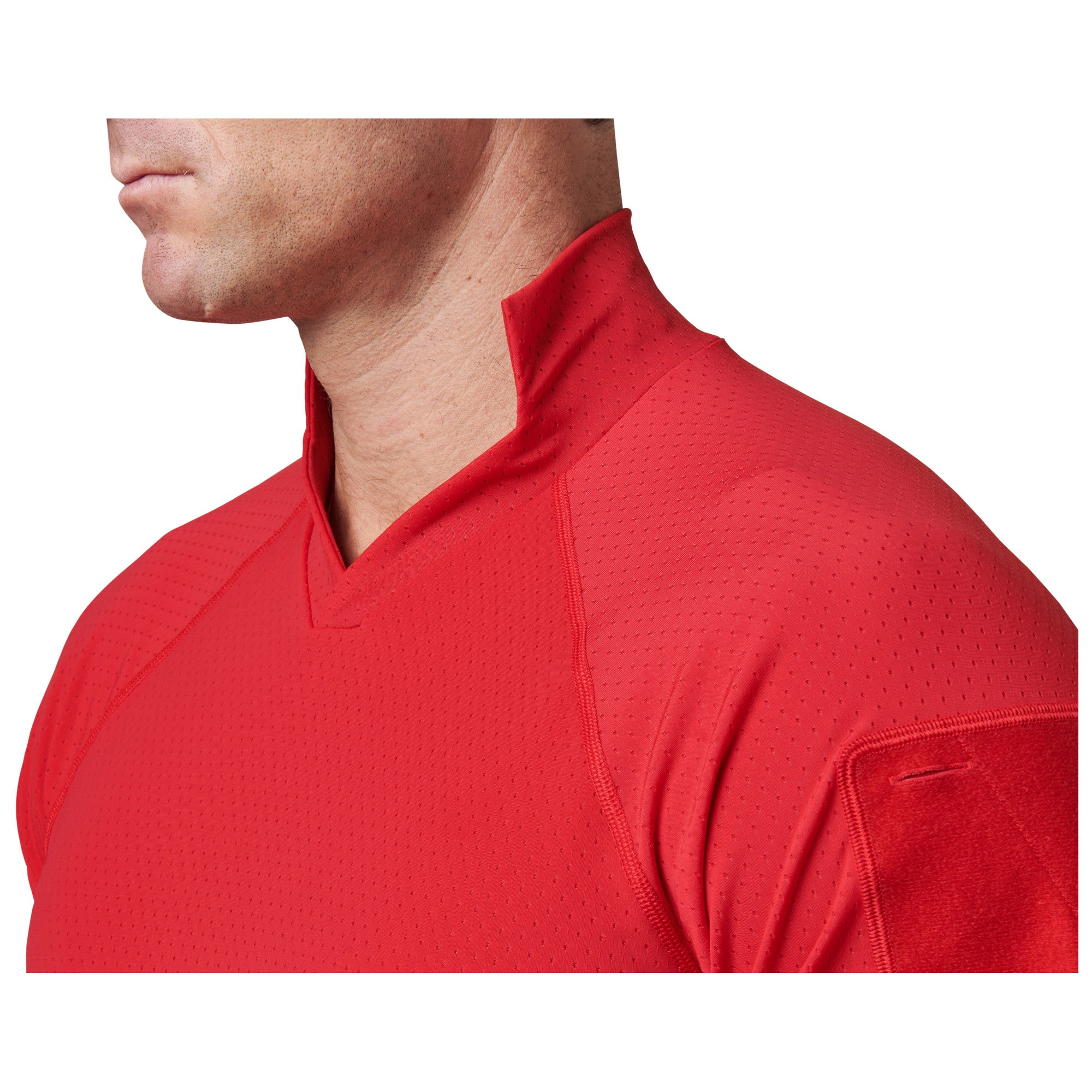 Red athletic shirt worn by a person on a white background