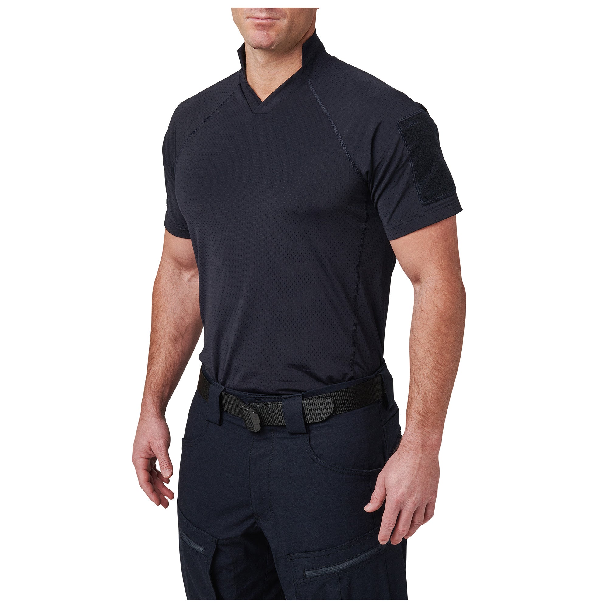 Person wearing a black short-sleeve shirt and pants on a white background