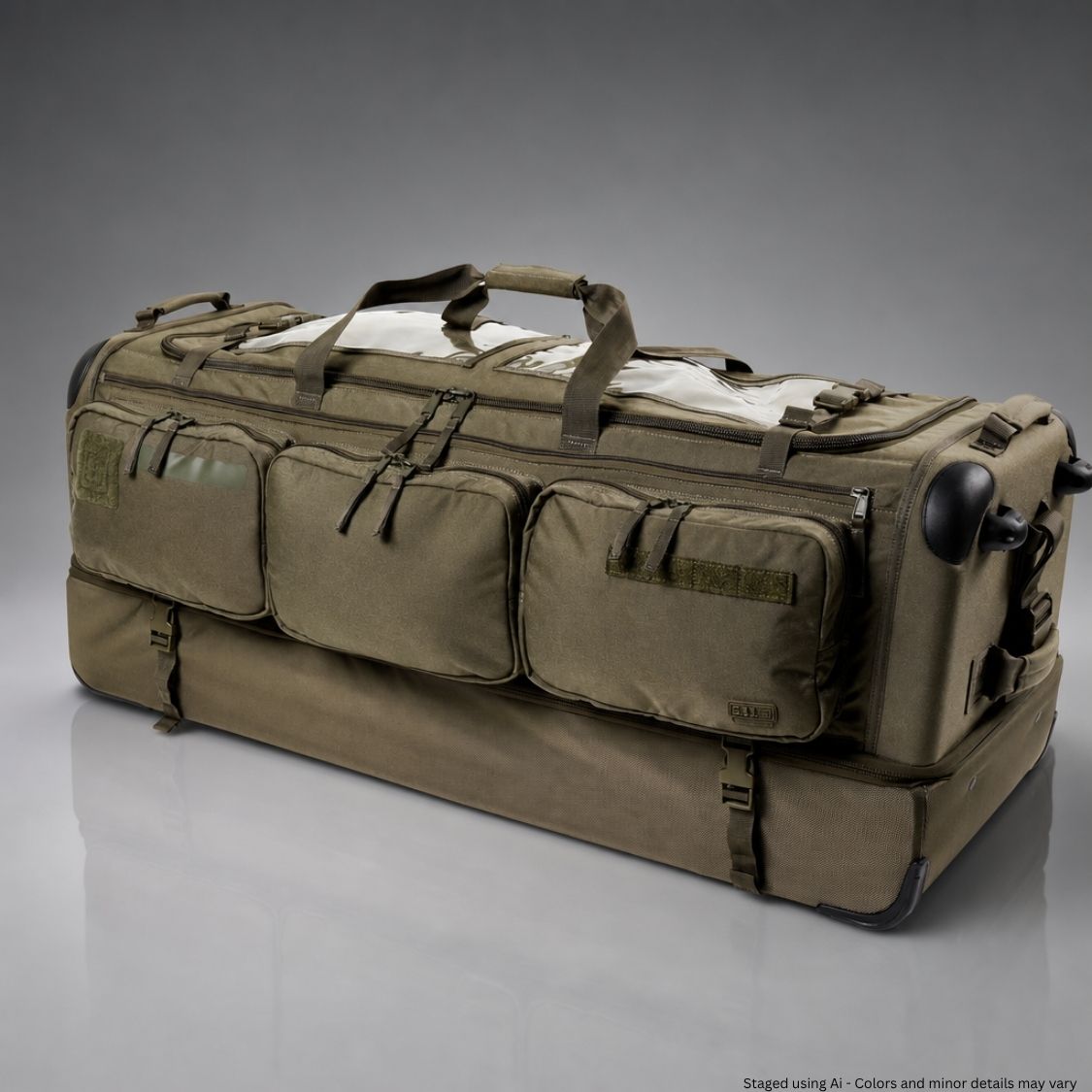 Large ranger green travel bag with multiple compartments on a gray background