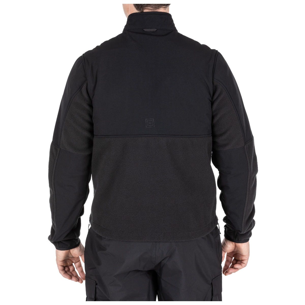 Black jacket worn by a person on a white background