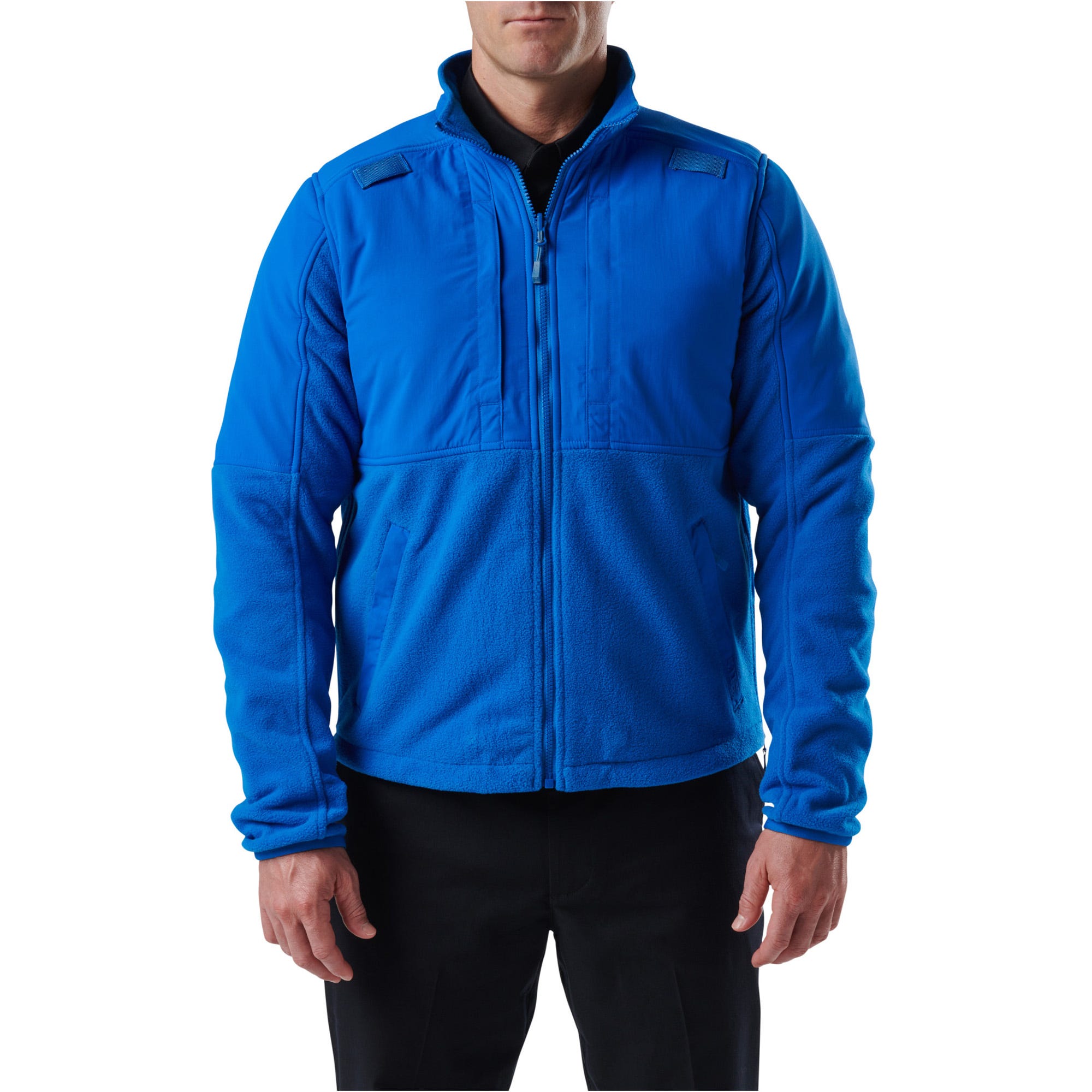 Blue jacket worn by a person on a white background
