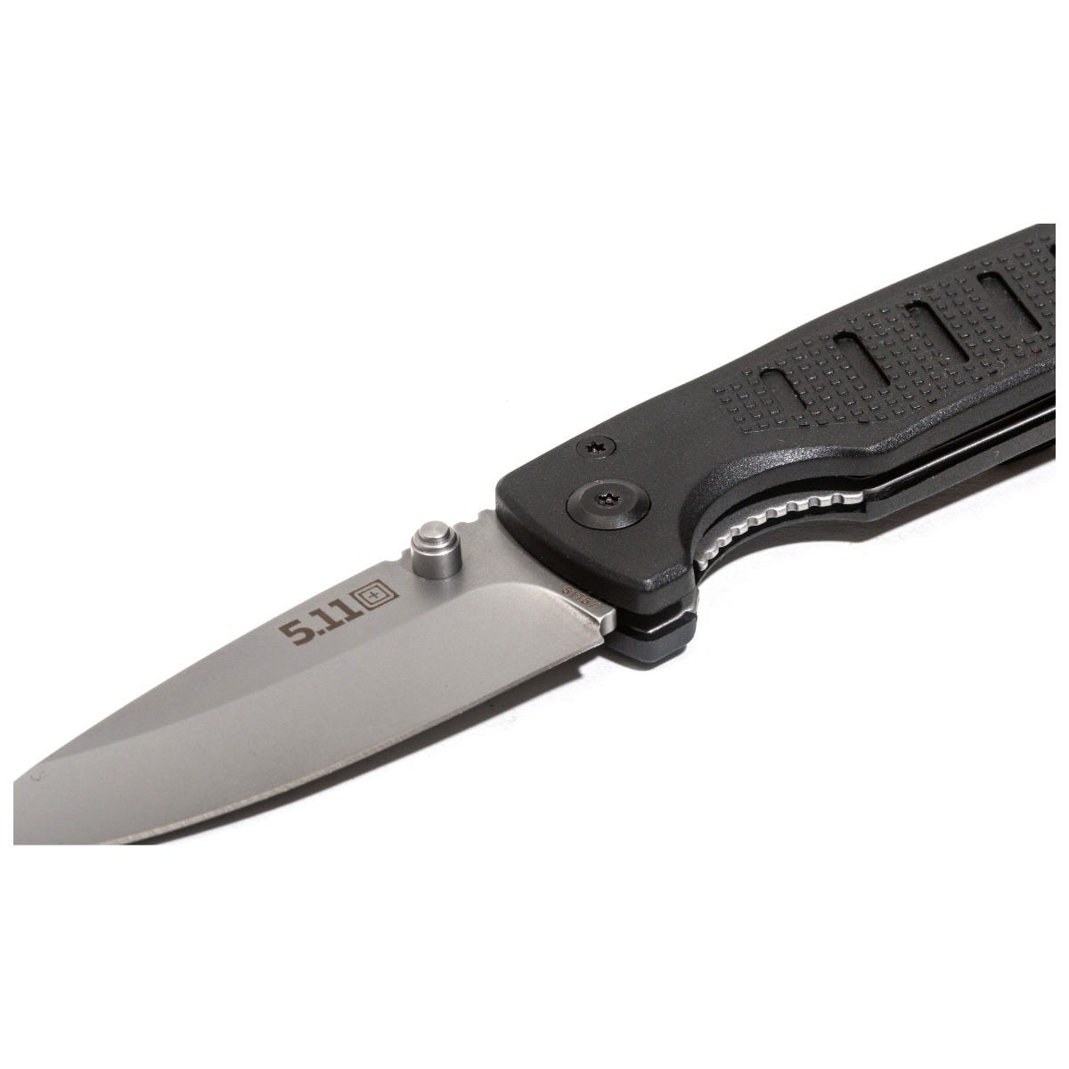 Folding knife with black handle and silver blade on a white background