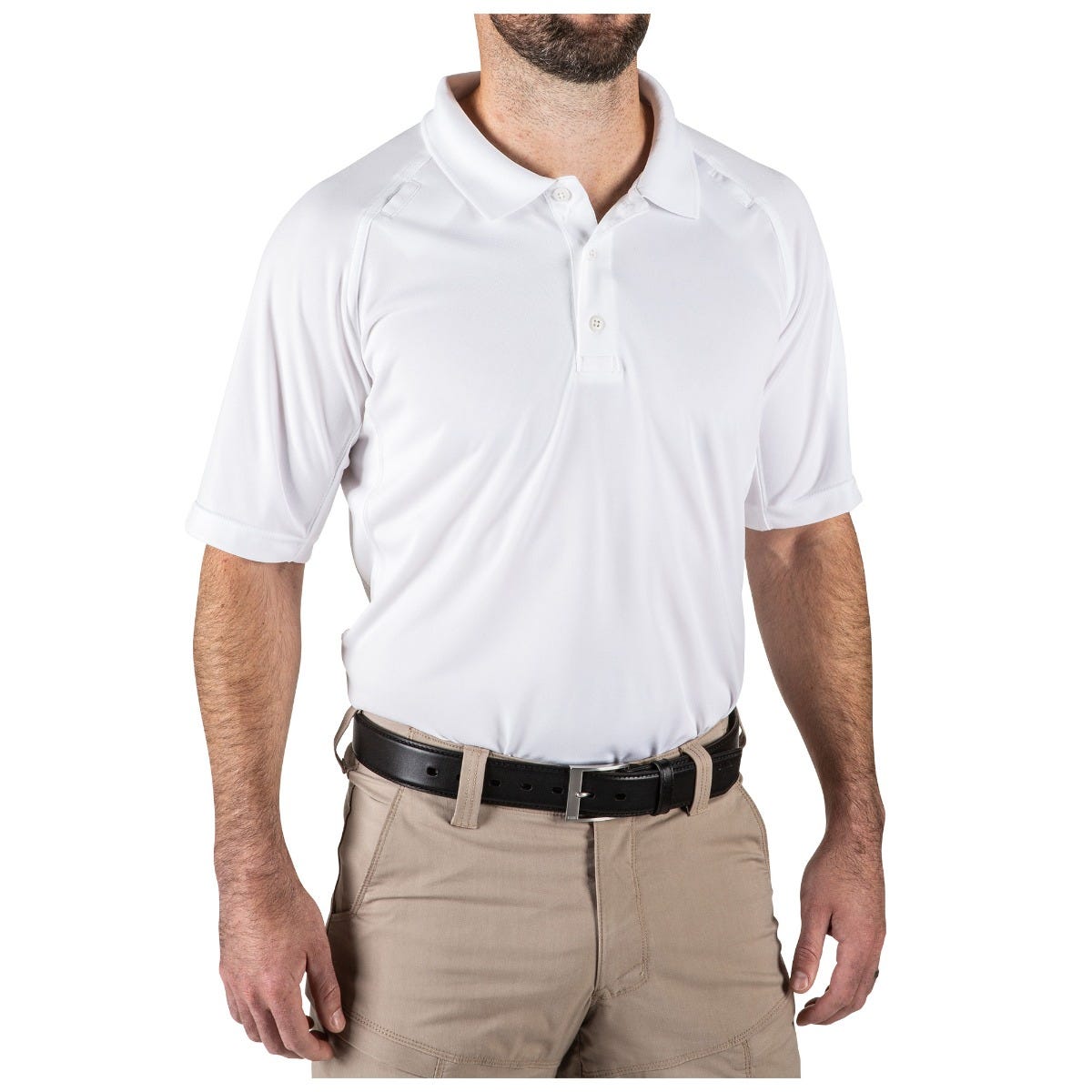 Man wearing a white polo shirt and beige pants on a white background