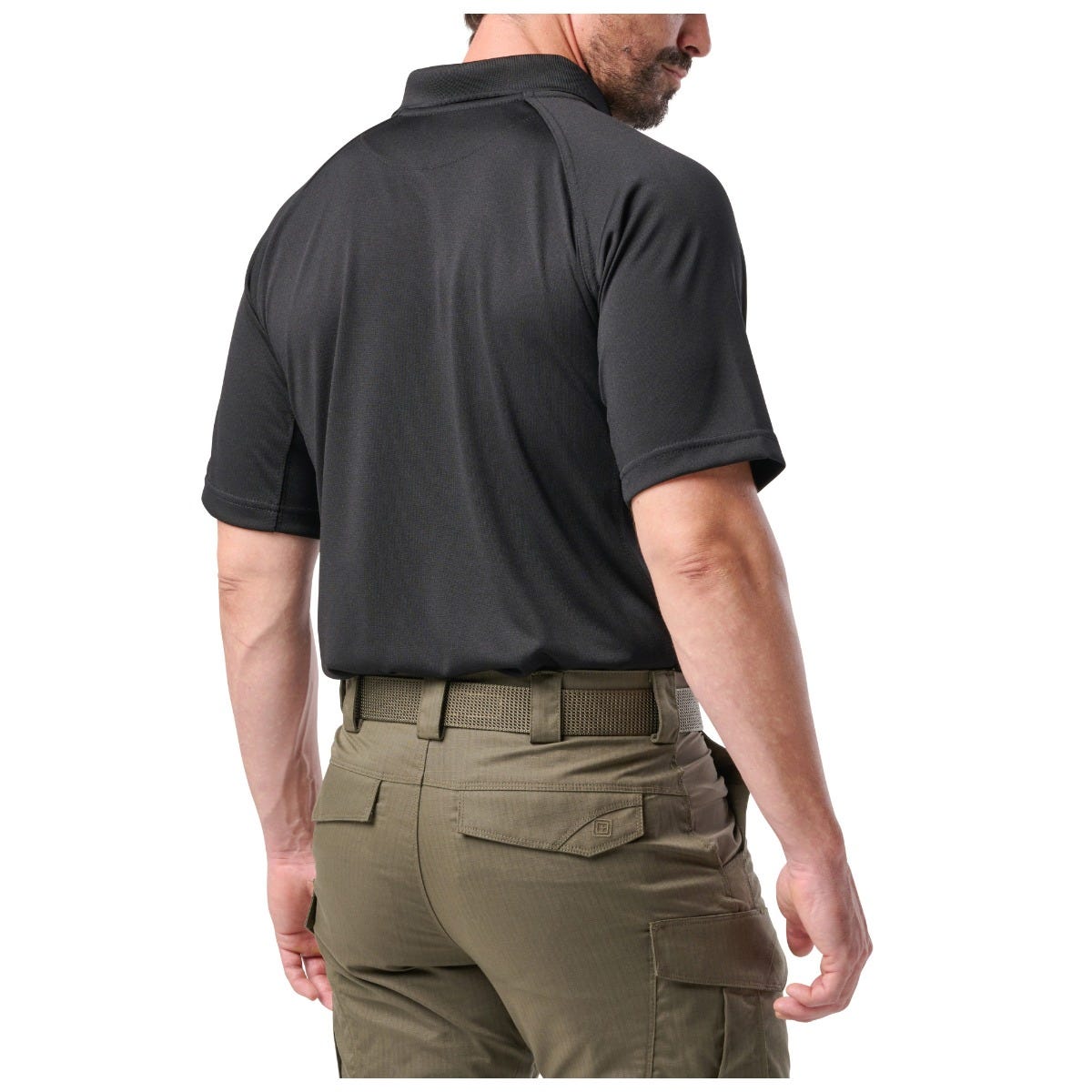 Man wearing a black short-sleeve shirt and green pants on a white background