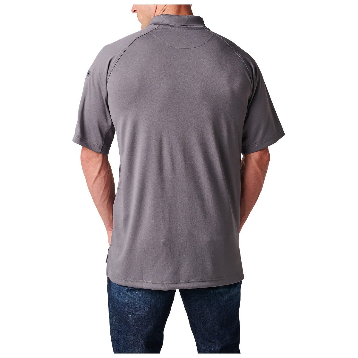 Gray polo shirt worn by a person on a white background