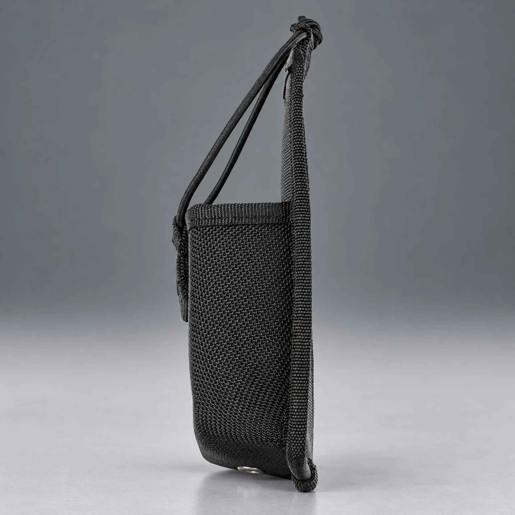 Right side profile of the 5.11 Sierra Bravo radio pouch showing bungee retention cord