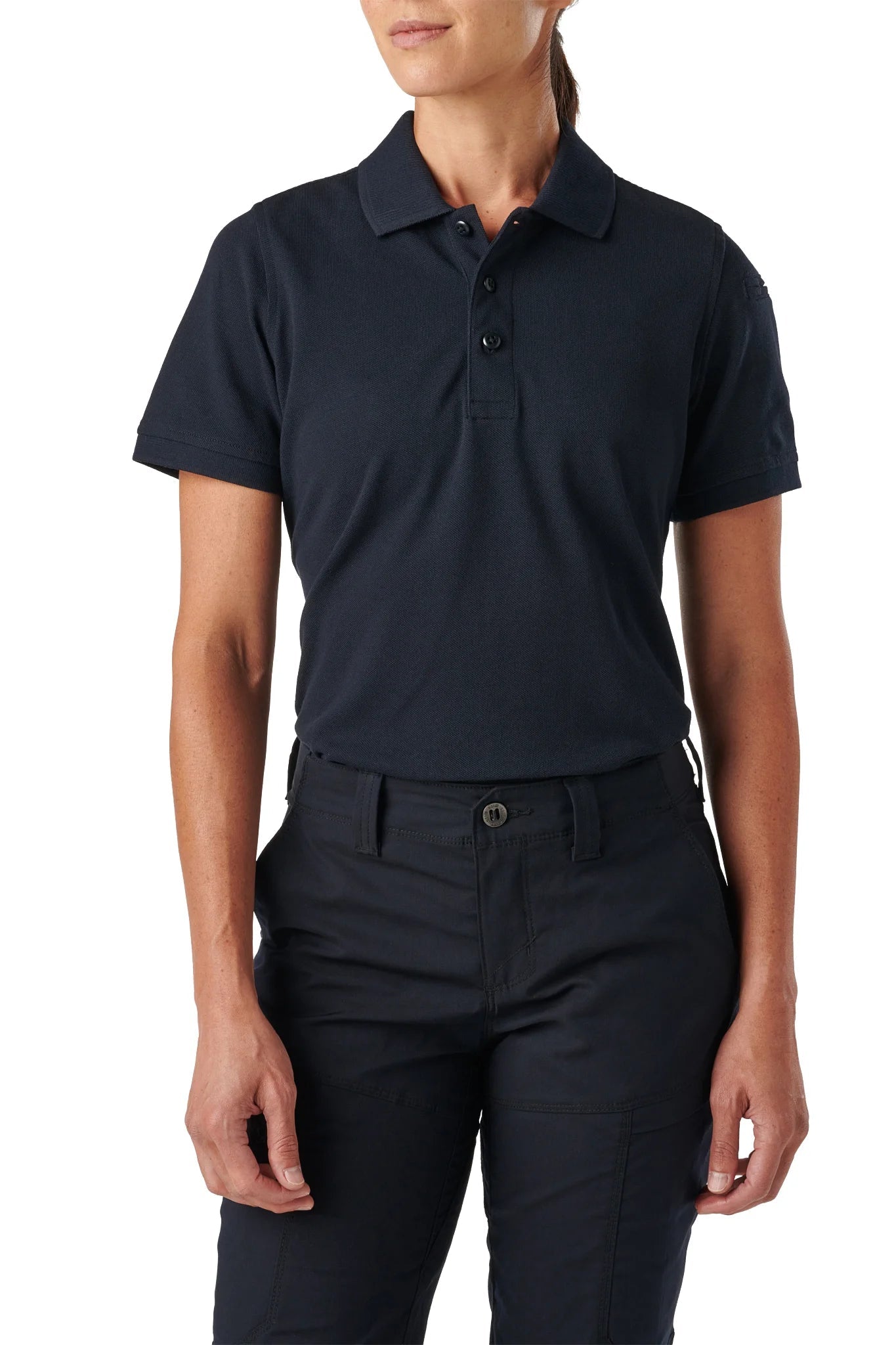 Woman wearing the 5.11 Women's Professional Polo in Dark Navy with navy uniform pants