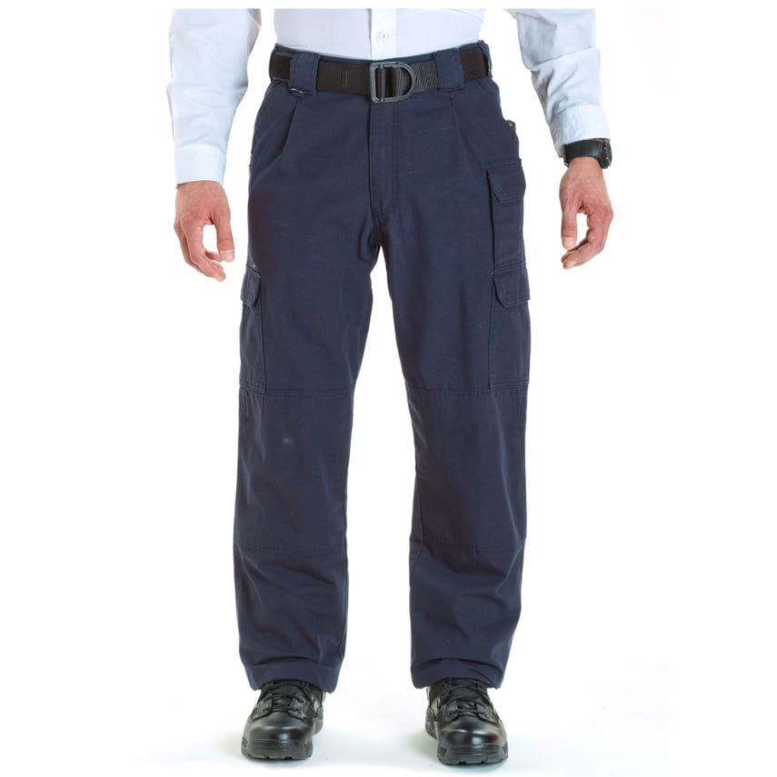 5.11 Tactical 100% Cotton Canvas Tactical Pants 74251 worn by a man, showcasing durability and utility in a professional setting.