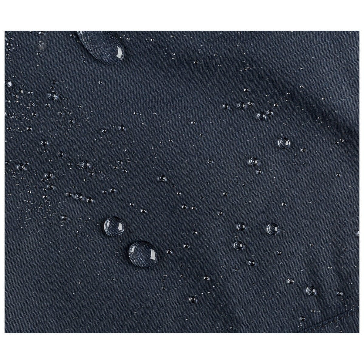 Close-up of water droplets on a dark fabric surface