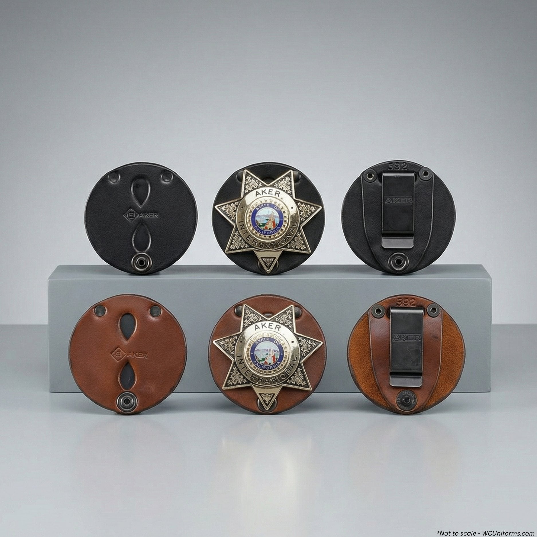 Set of five leather and metal items with star designs on a gray background