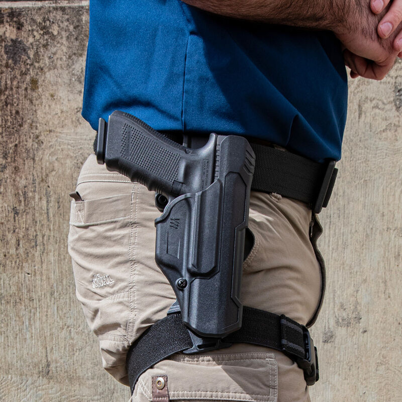 Man wearing BLACKHAWK! T-Series JSBL Leg Strap Adapter Black 432400BK