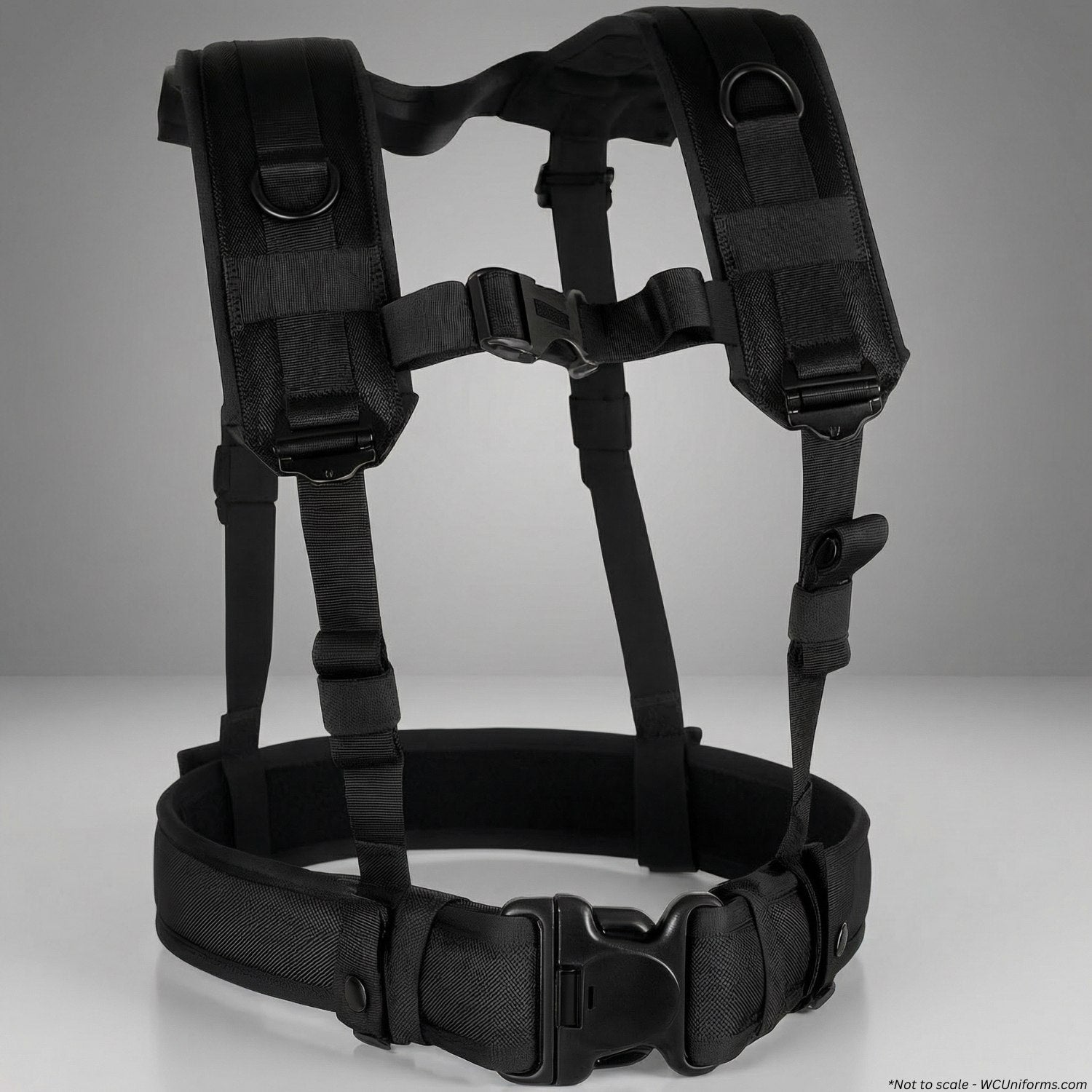 Black tactical harness on a gray background