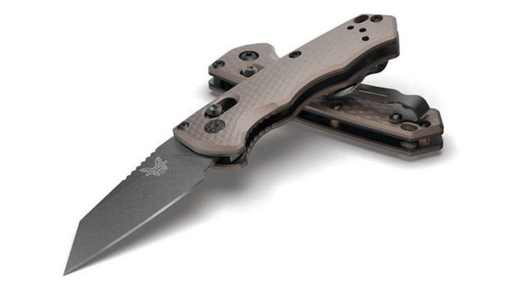 Benchmade AUTO IMMUNITY knife in charcoal grey, featuring AXIS mechanism and compact design for everyday carry.