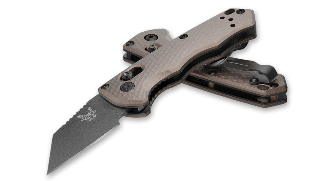 Benchmade Partial Immunity AXIS knife with burnt bronze handle and wharncliffe blade, compact design for legal carry.