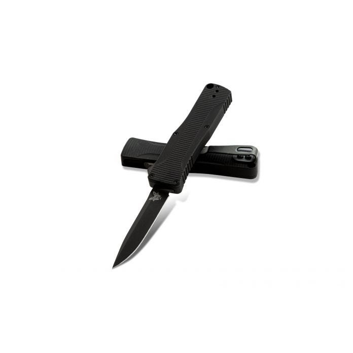 Benchmade OM OTF automatic knife with a sleek black handle and blade, designed for discreet and quick action.