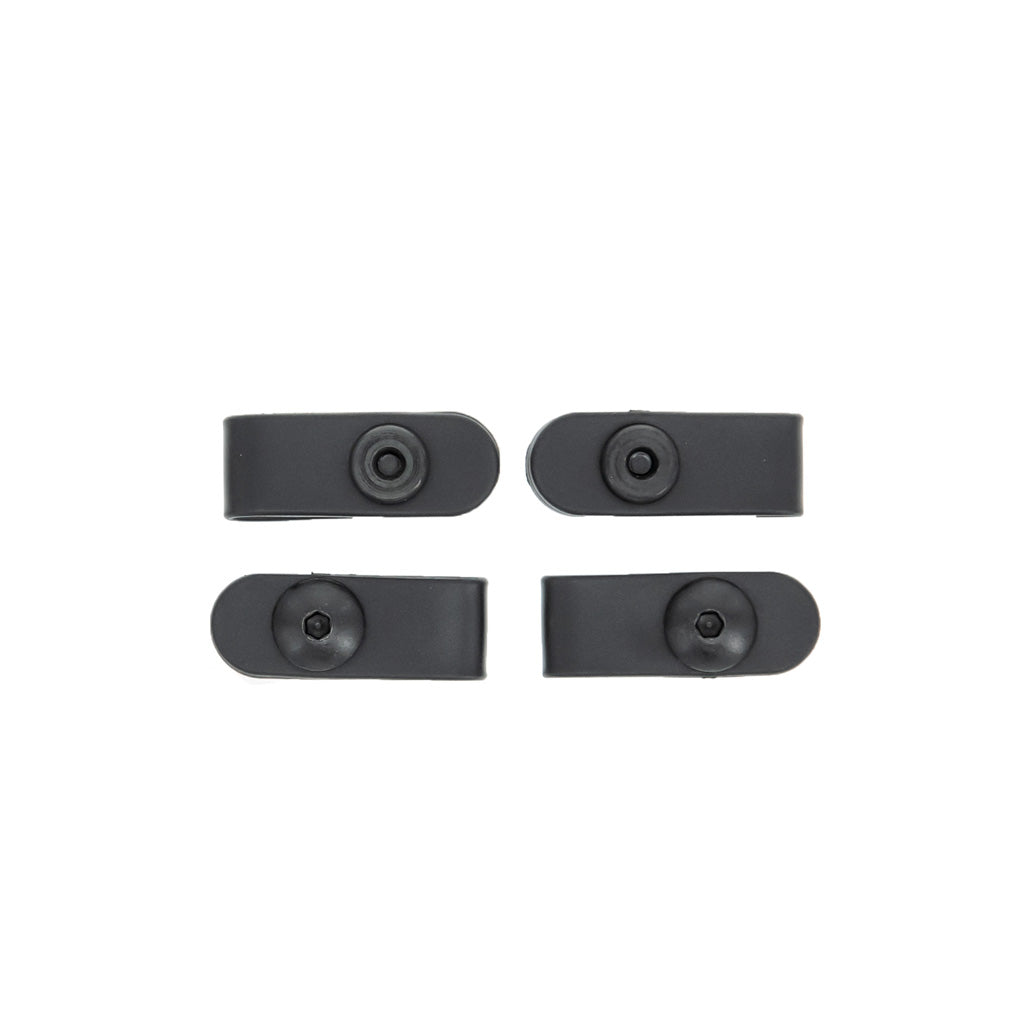 Safariland BWA Belt Width Adaptors in black, four-pack, designed to reduce belt width by 0.5 inches, compatible with UBLs and loops.