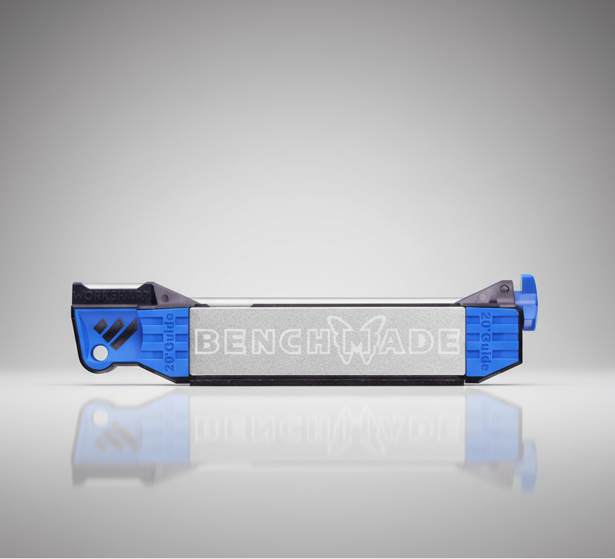 Benchmade knife sheath on a reflective surface with a gray background