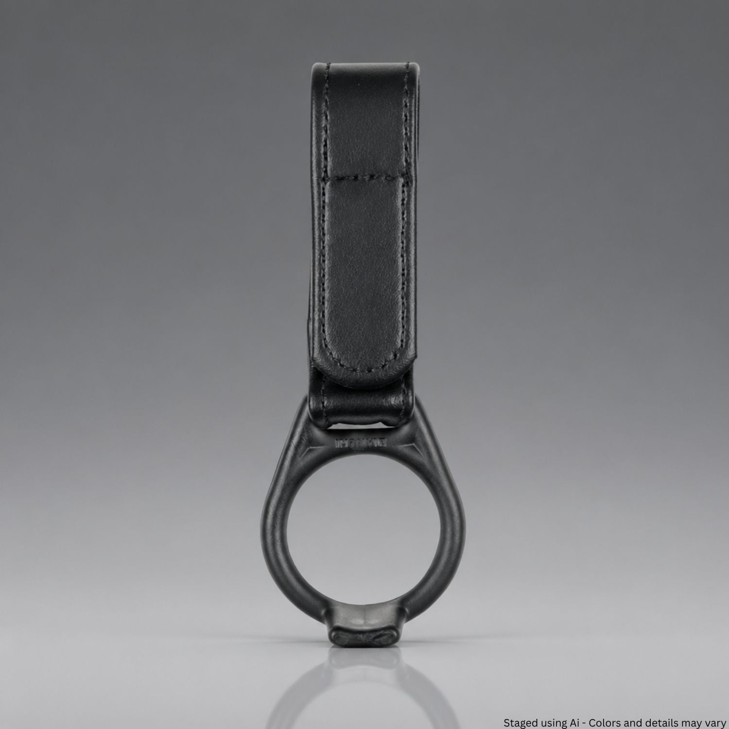 Black faux leather PR-24 baton ring on a gray background