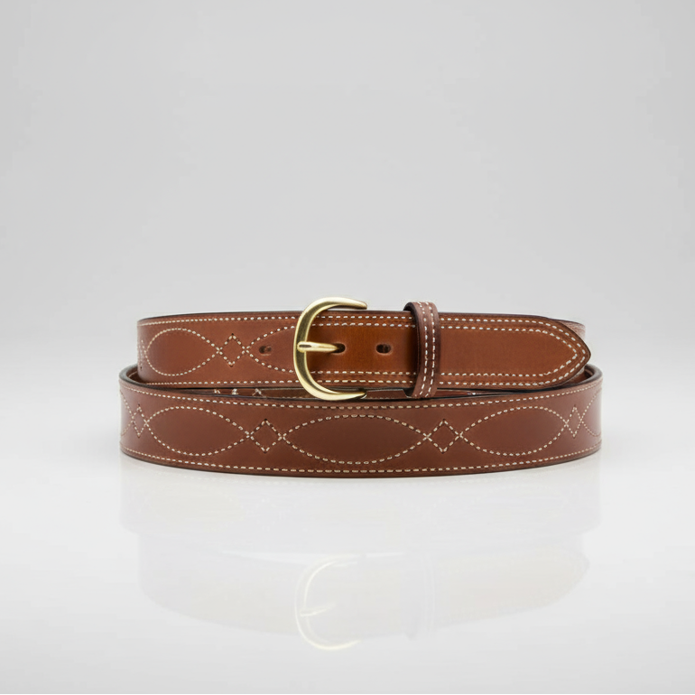 Brown leather belt with gold buckle on a light gray background