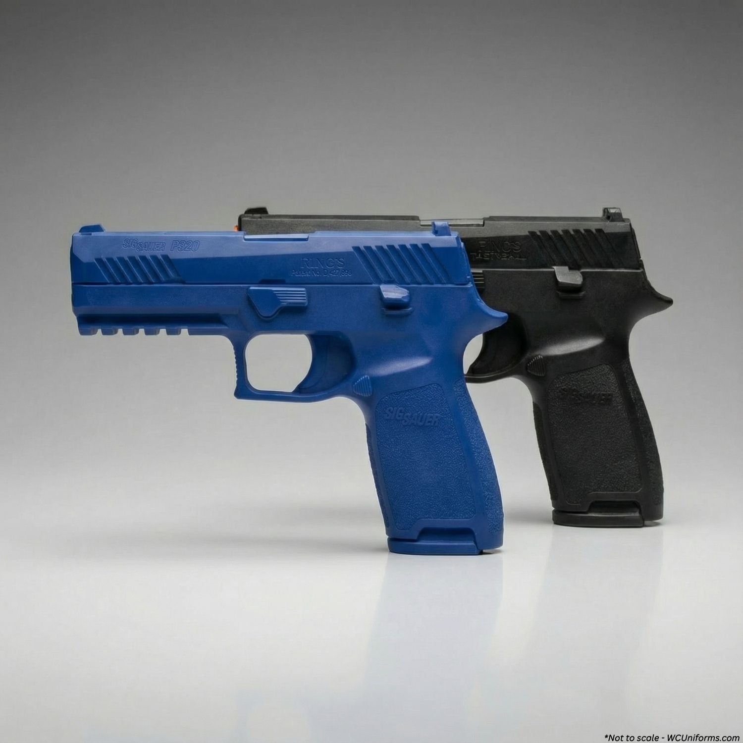 Blue and black handgun models on a gray background