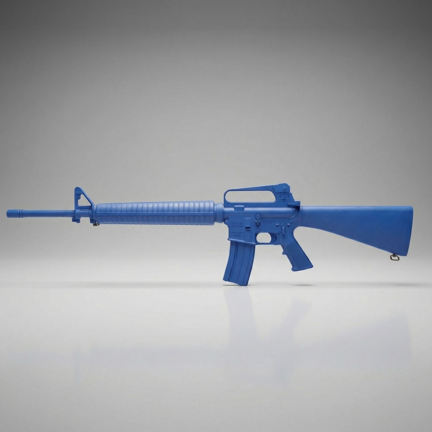 Blue police training rifle on a gray background