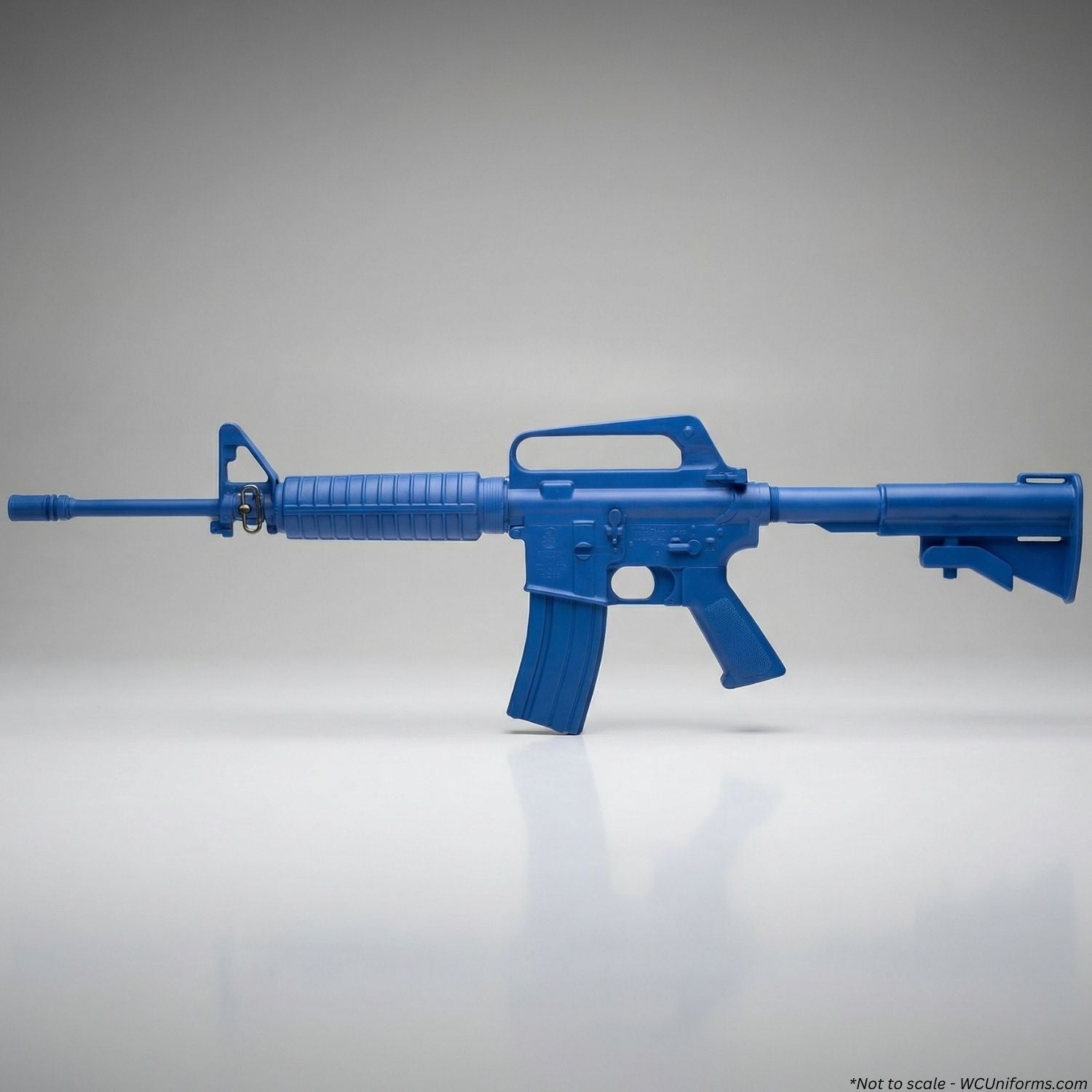 Blue training rifle on a gray background