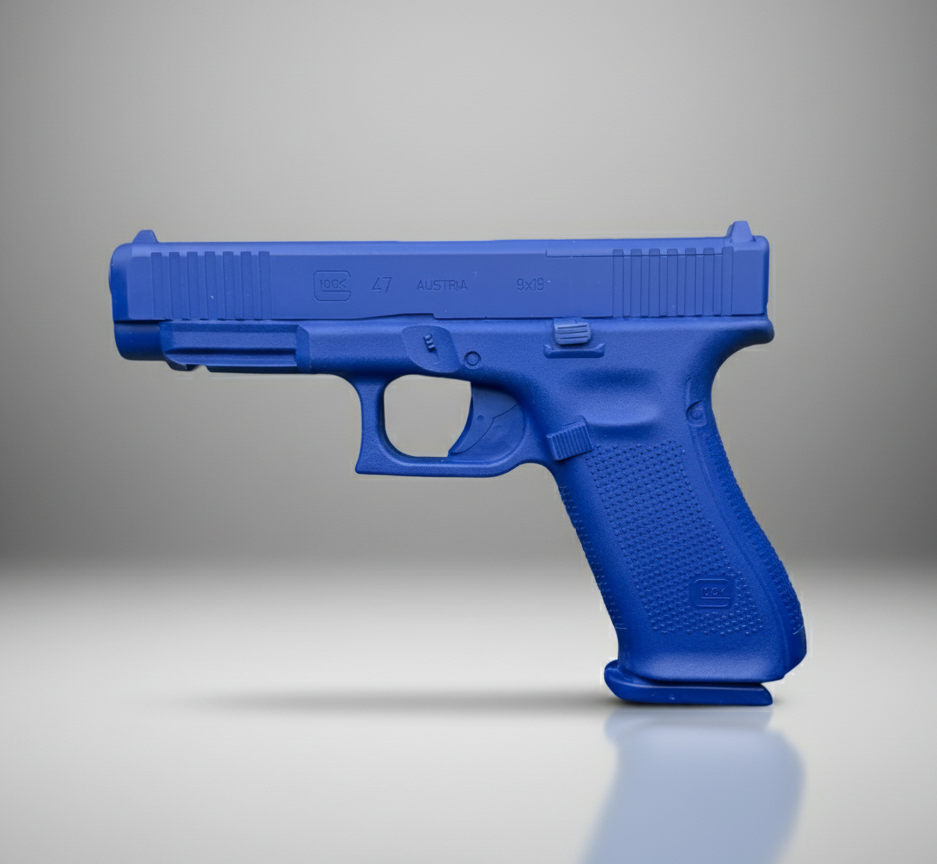 Blue Training Guns By Rings For Glock 47 MOS Firearm Simulator | FSG47-MOS on a reflective surface with a gray background