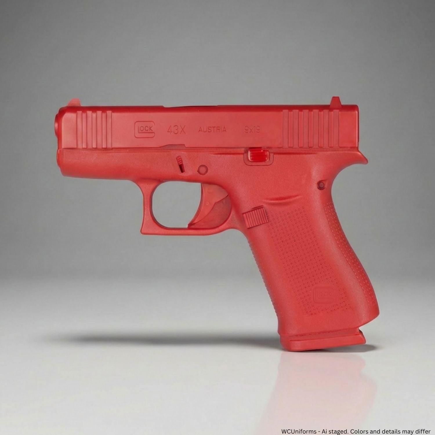 Red gun-shaped object on a gray background